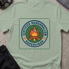 Certified Marshmallow Manager T-Shirt in Sage, front view.
