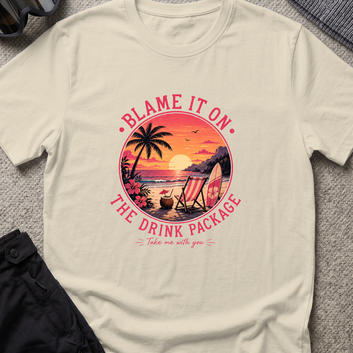 Blame It On The Drink Package — Sunset Cove T-Shirt in Sand, front view.