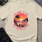 Blame It On The Drink Package — Sunset Beach T-Shirt in Sand, front view.
