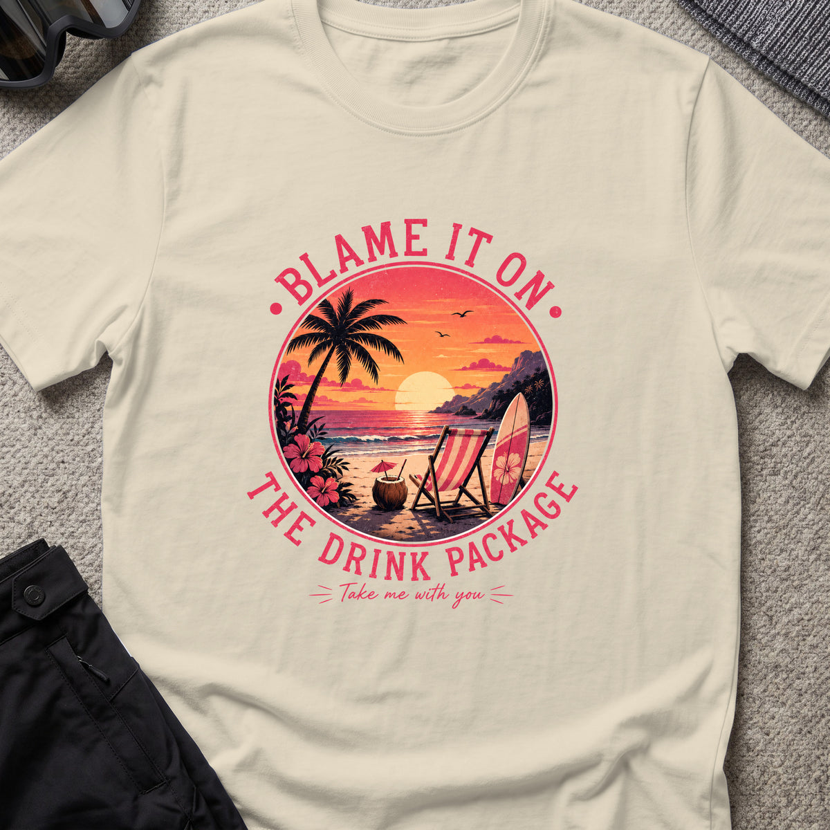 Blame It On The Drink Package — Sunset Beach T-Shirt in Sand, front view.