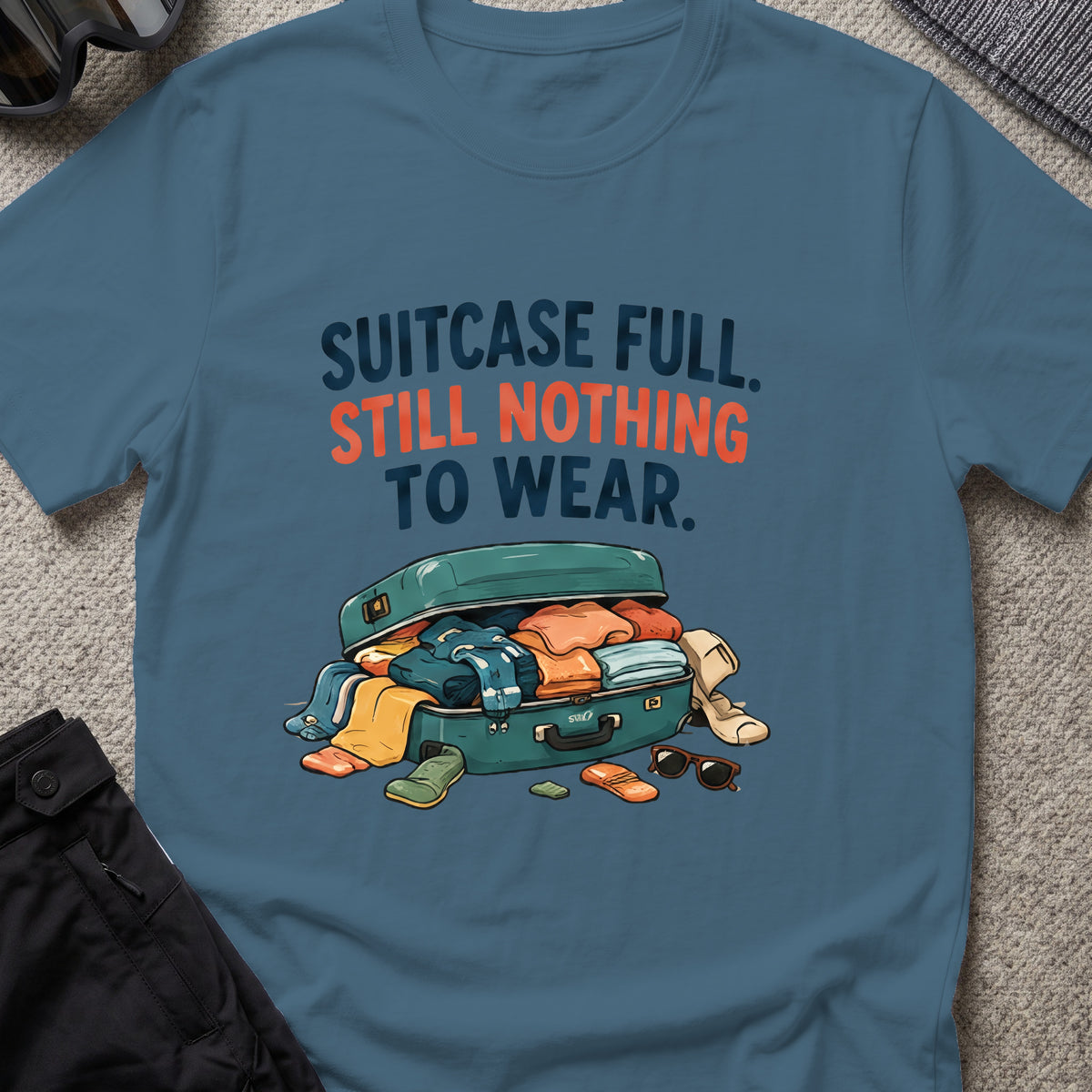 Suitcase Full Still Nothing to Wear T-Shirt in Indigo Blue, front view.
