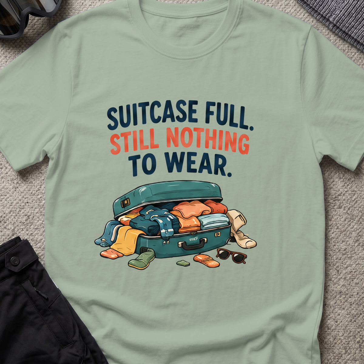 Suitcase Full Still Nothing to Wear T-Shirt in Sage, front view.