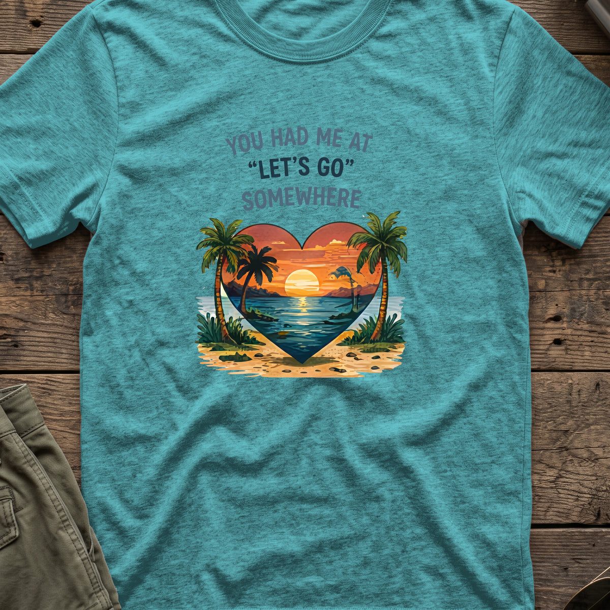 You Had Me at Let's Go Somewhere T-Shirt in Heather Galapagos Blue, front view.