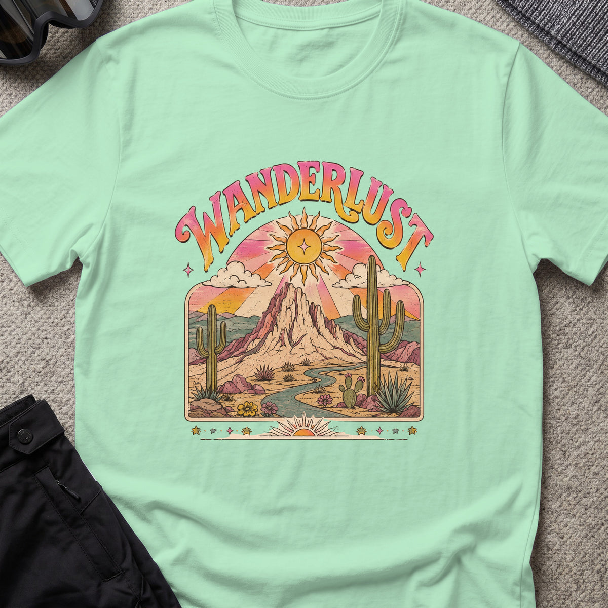 Wanderlust T-Shirt — Desert Sunburst in Mint Green, front view.