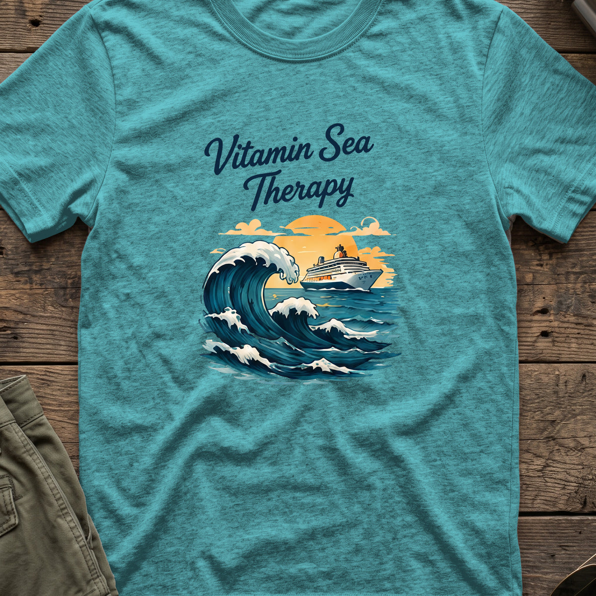 Vitamin Sea Therapy T-Shirt — Big Wave in Heather Galapagos Blue, front view.