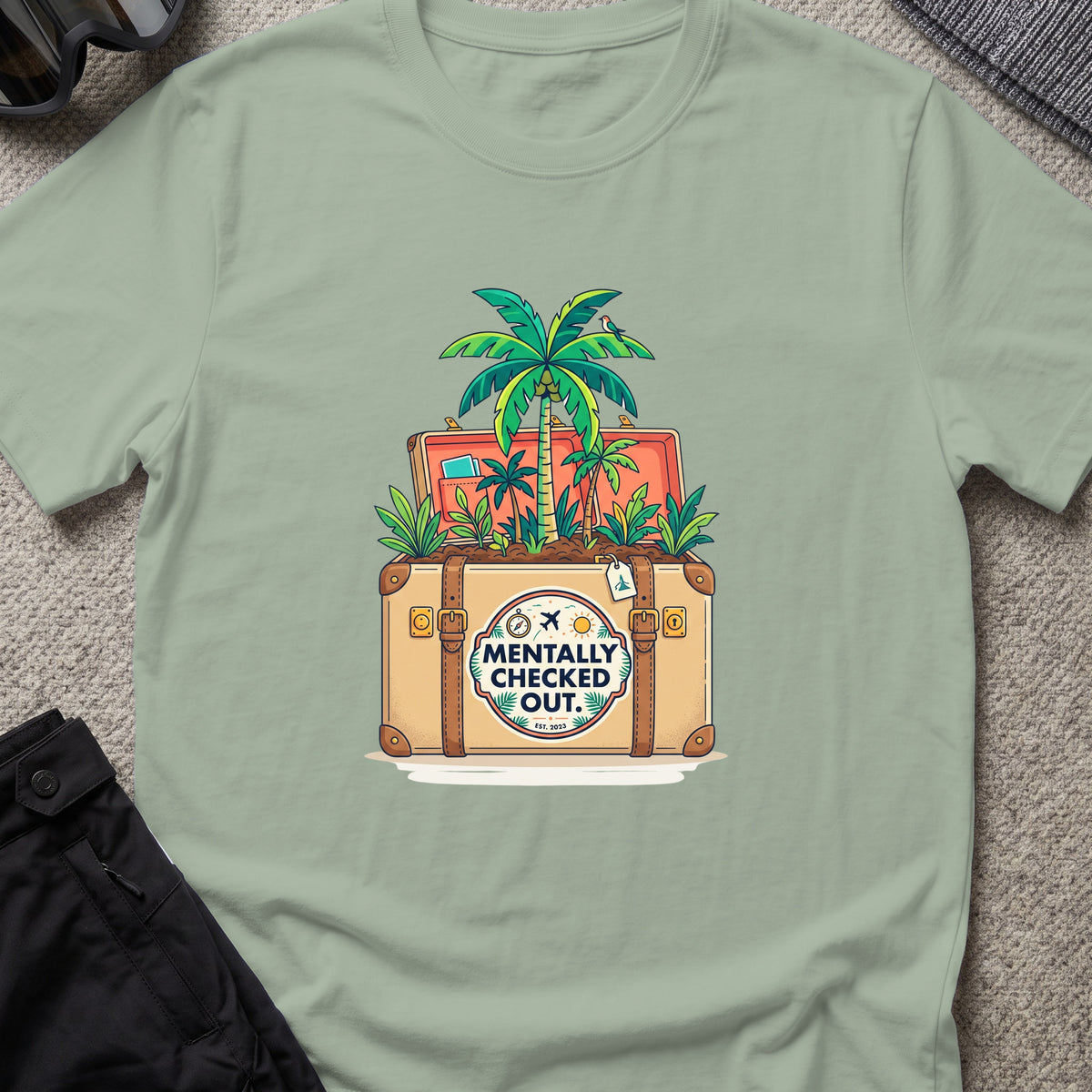 Mentally Checked Out T-Shirt in Sage, front view.