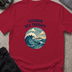 Vitamin Sea Therapy T-Shirt — Wave Badge in Cardinal Red, front view.
