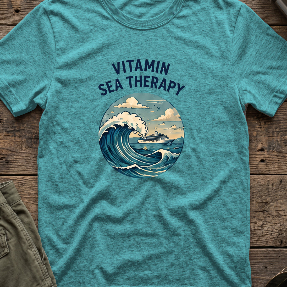 Vitamin Sea Therapy T-Shirt — Wave Badge in Heather Galapagos Blue, front view.