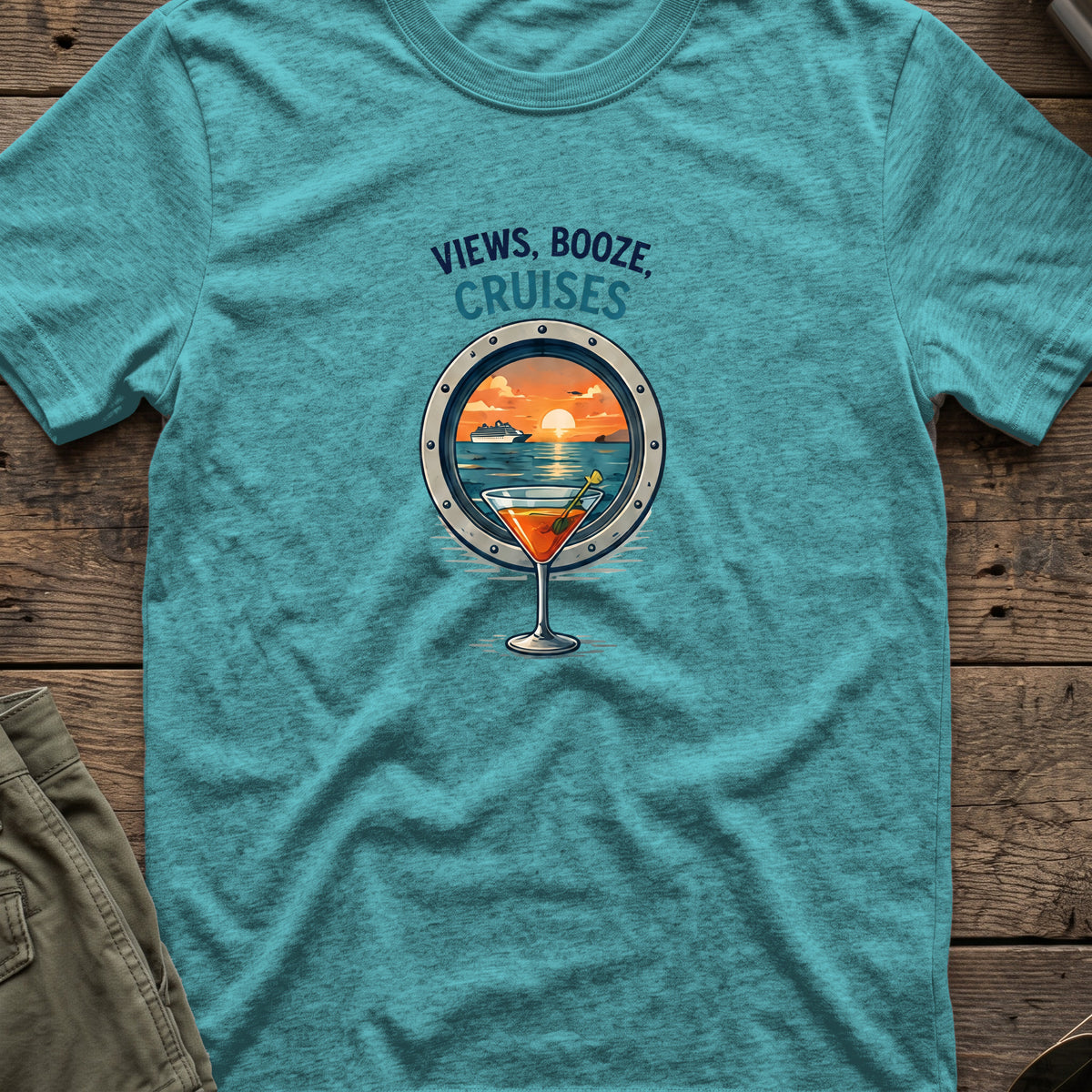 Views, Booze, and Cruises T-Shirt — Cocktail in Heather Galapagos Blue, front view.