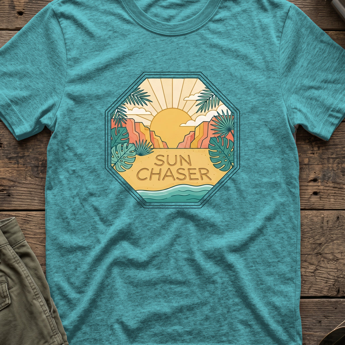 Sun Chaser T-Shirt — Sun Badge in Heather Galapagos Blue, front view.