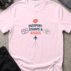 Passport Stamps and Kisses T-Shirt in Light Pink, front view.