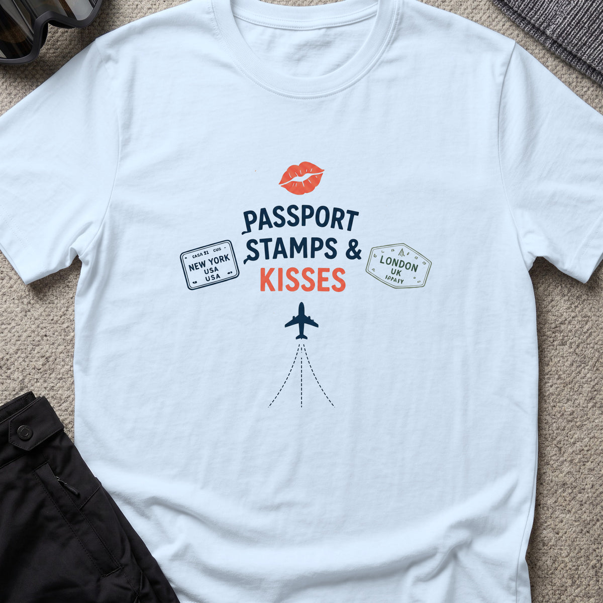 Passport Stamps and Kisses T-Shirt in Light Blue, front view.