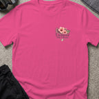 Packed the Island T-Shirt in Heliconia, front view.