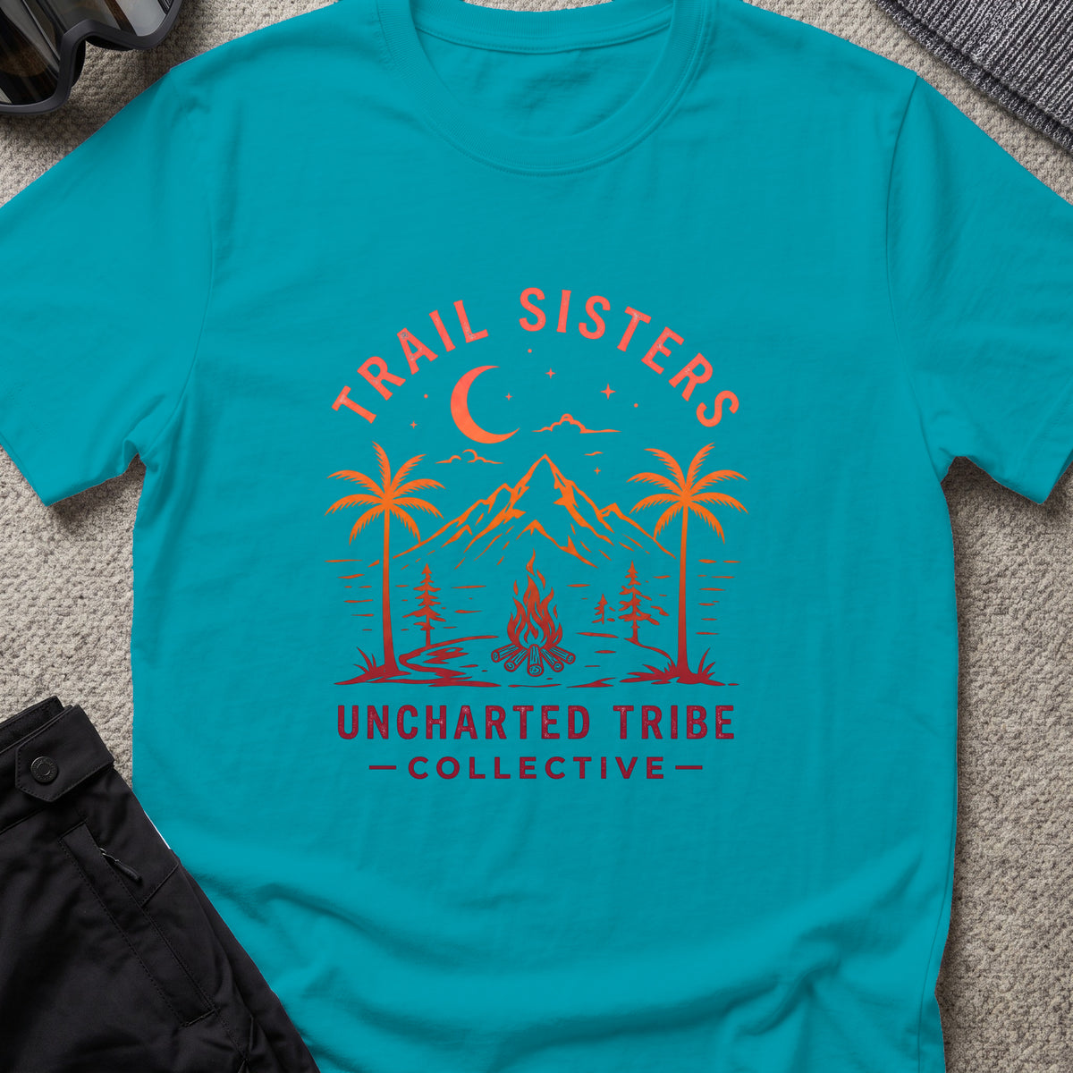 Trail Sisters T-Shirt in Tropical Blue, front view.