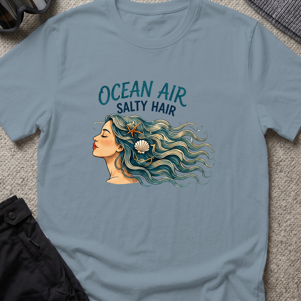Ocean Air Salty Hair T-Shirt in Stone Blue, front view.
