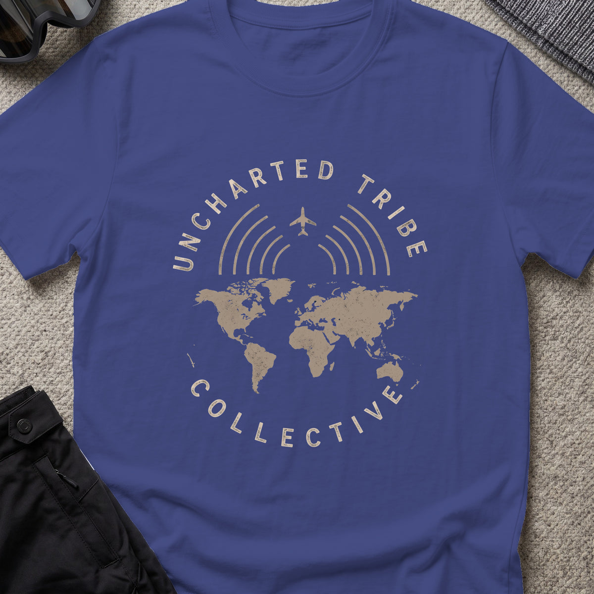 Uncharted Tribe Collective Global T-Shirt in Metro Blue, front view.