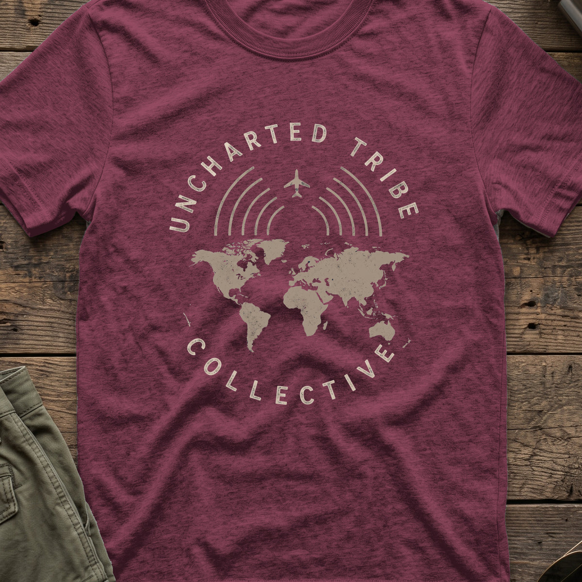 Uncharted Tribe Collective Global T-Shirt in Heather Maroon, front view.