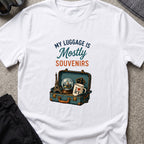 My Luggage is Mostly Souvenirs T-Shirt in White, front view.