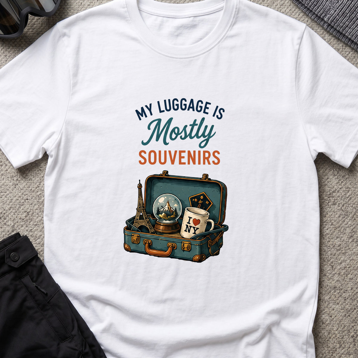 My Luggage is Mostly Souvenirs T-Shirt in White, front view.