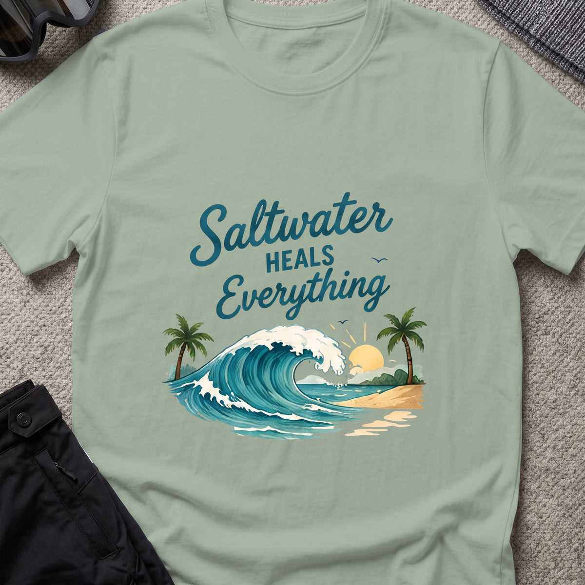 Saltwater Heals Everything T-Shirt in Sage, front view.