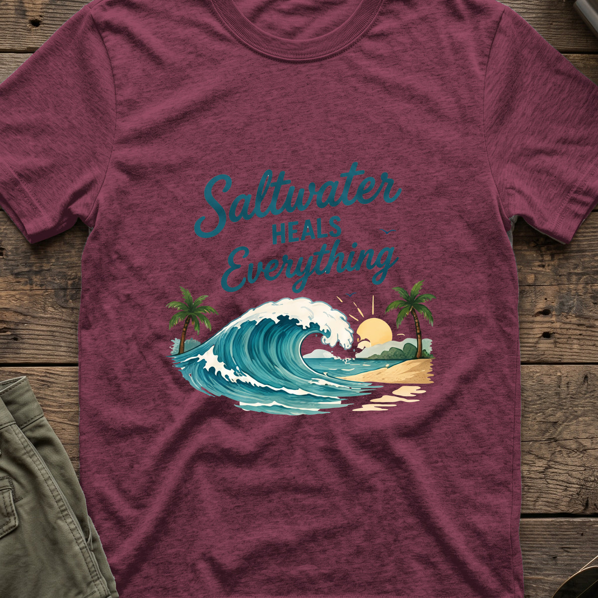 Saltwater Heals Everything T-Shirt in Heather Maroon, front view.