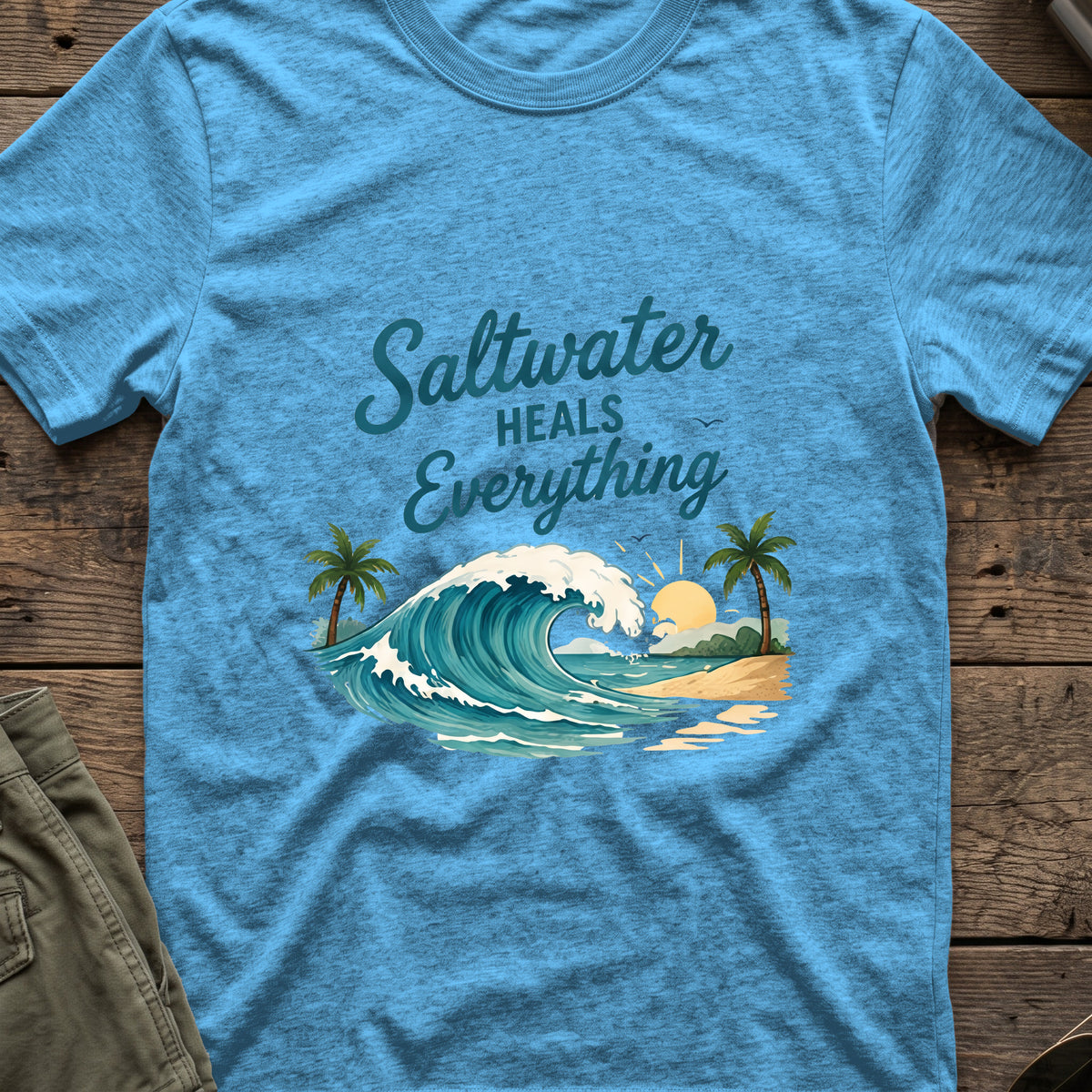 Saltwater Heals Everything T-Shirt in Heather Sapphire, front view.