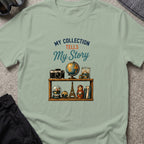 My Collection Tells My Story T-Shirt in Sage, front view.