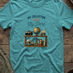 My Collection Tells My Story T-Shirt in Heather Galapagos Blue, front view.