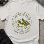 Uncharted Tribe Collective T-Shirt — Mountain Seal in Ice Grey, front view.