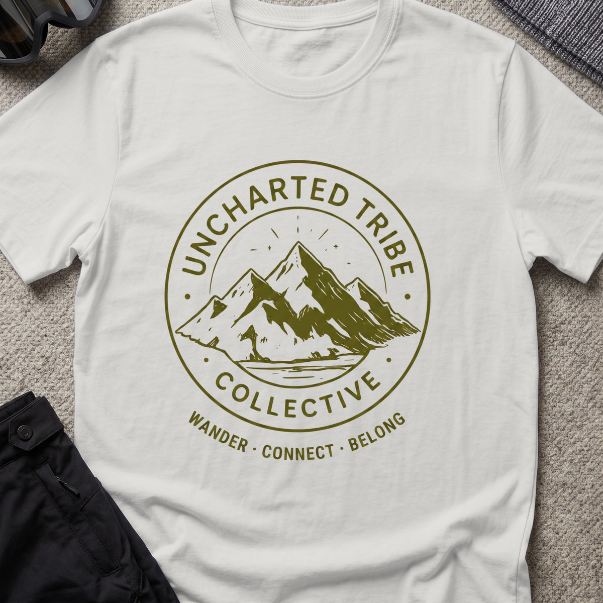 Uncharted Tribe Collective T-Shirt — Mountain Seal in Ice Grey, front view.