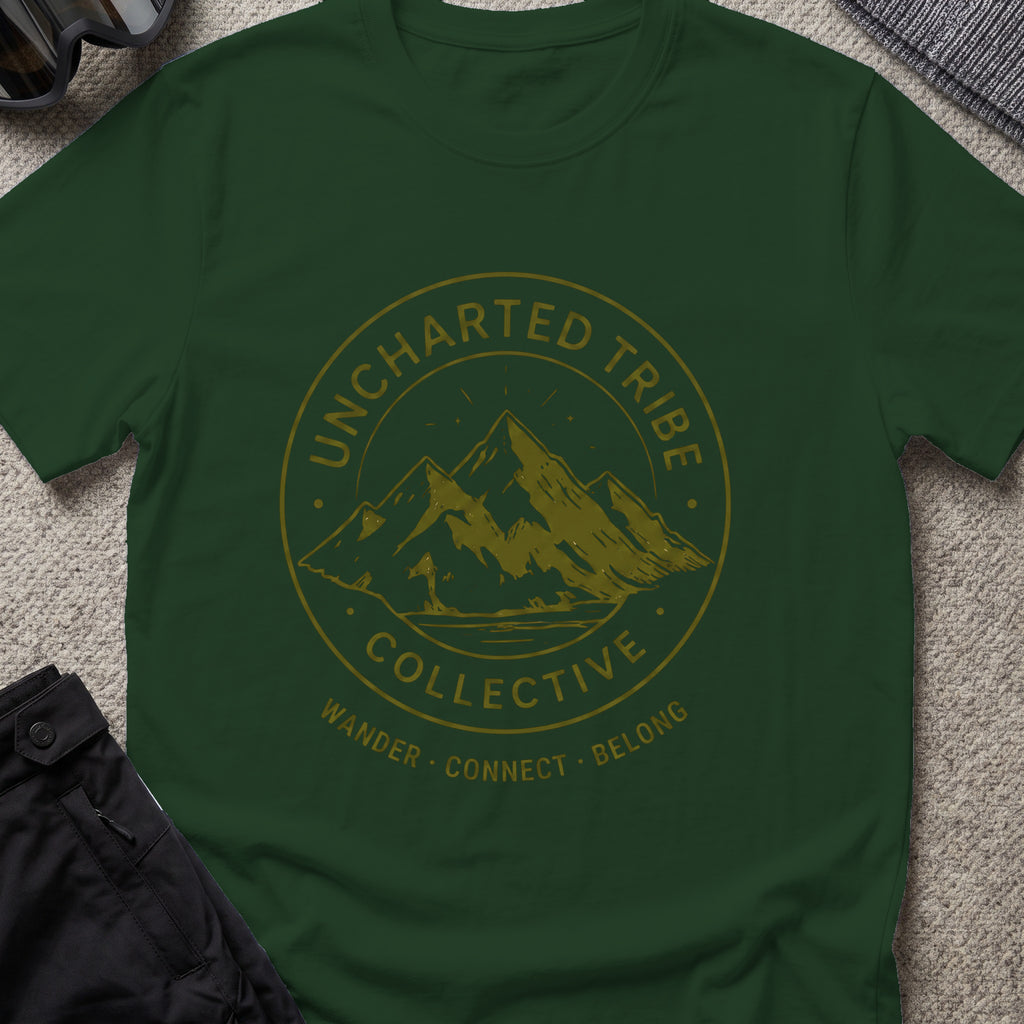 Uncharted Tribe Collective T-Shirt — Mountain Seal in Forest Green, front view.