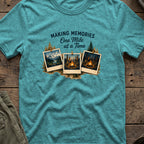 Making Memories One Mile at a Time T-Shirt in Heather Galapagos Blue, front view.