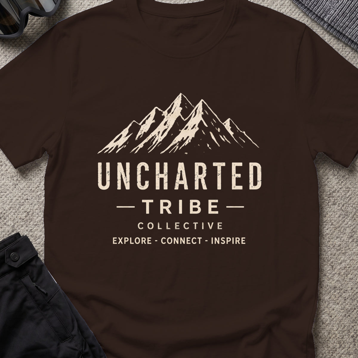 Uncharted Tribe Collective T-Shirt — Summit Wordmark in Dark Chocolate, front view.