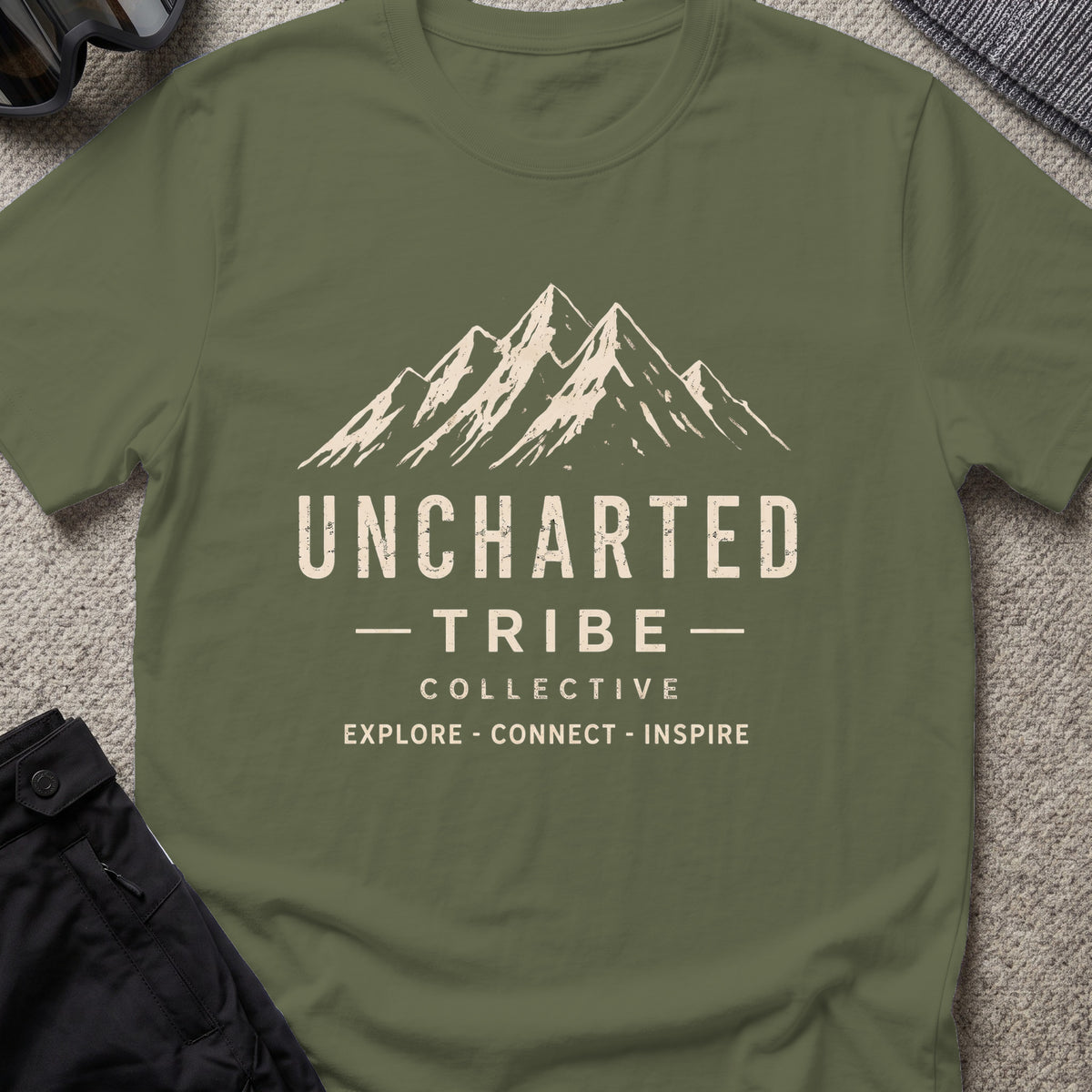 Uncharted Tribe Collective T-Shirt — Summit Wordmark in Military Green, front view.