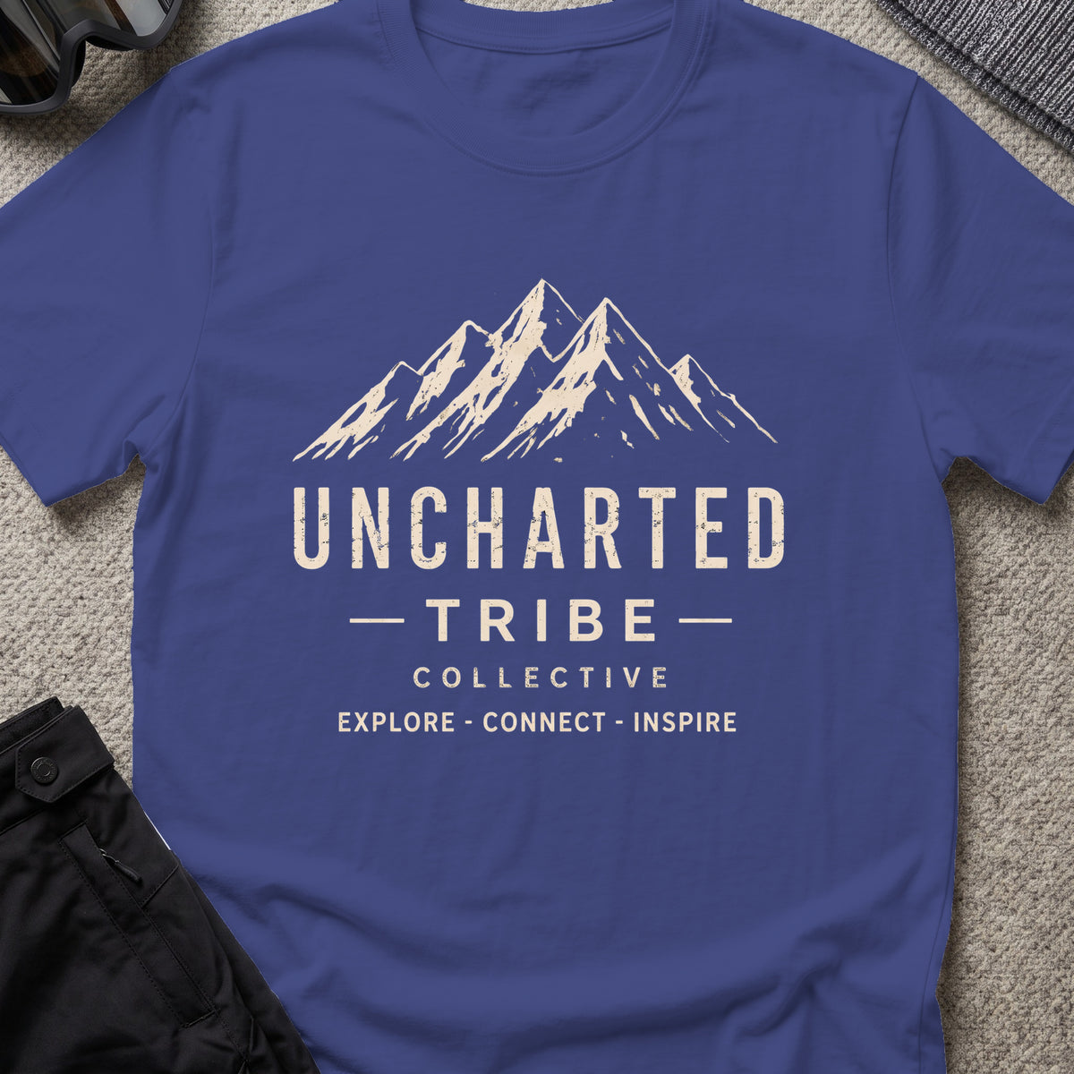 Uncharted Tribe Collective T-Shirt — Summit Wordmark in Metro Blue, front view.