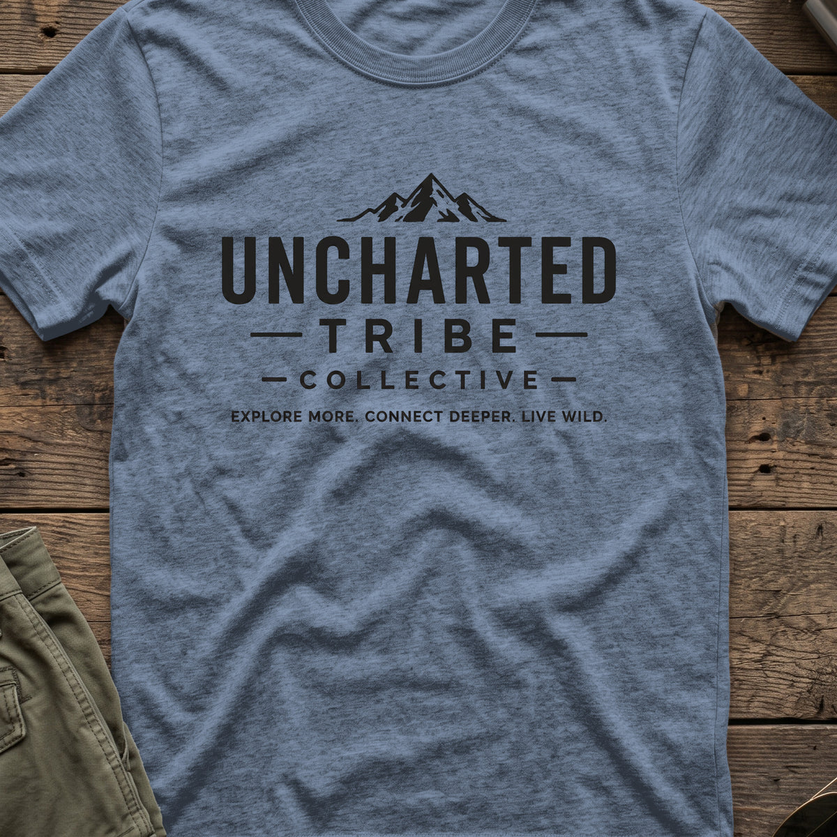 Explore More and Connect Deeper T-Shirt in Heather Indigo, front view.