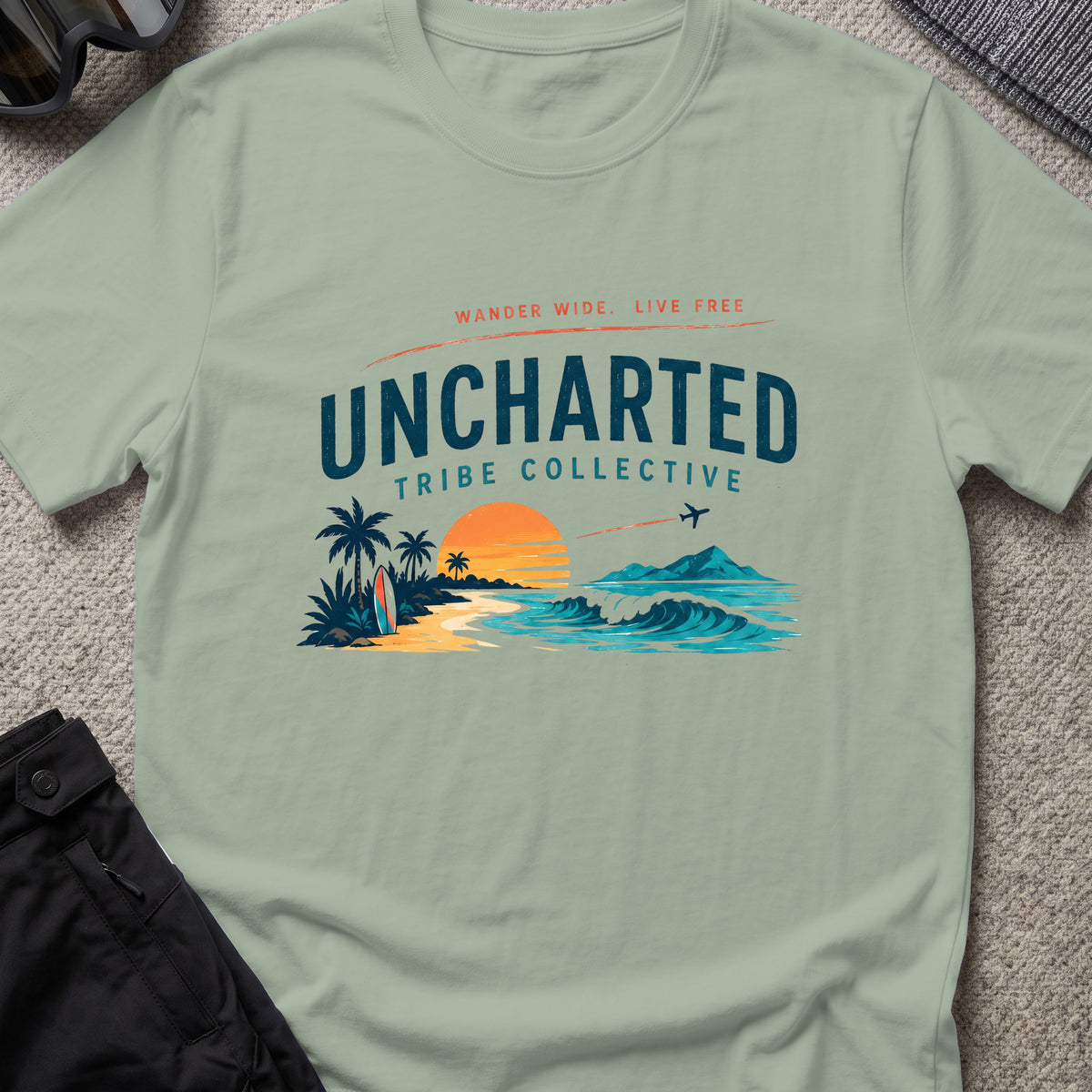 Wander Wide and Live Free T-Shirt in Sage, front view.