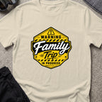 Warning Family Trip in Progress T-Shirt in Sand, front view.