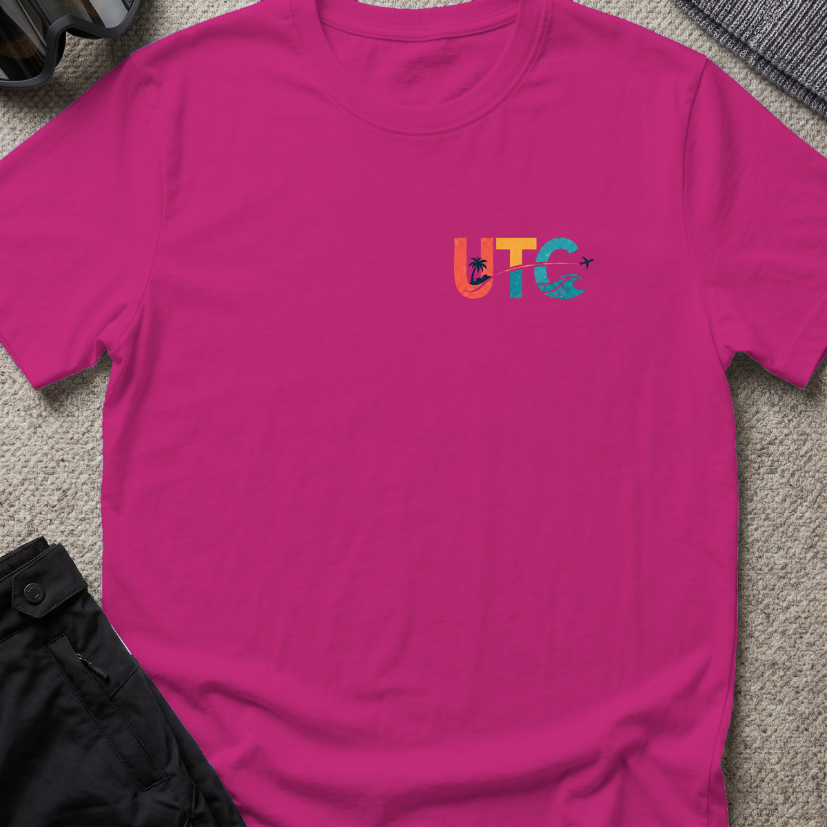 Uncharted Tribe Collective T-Shirt — Shoreline Seal in Antique Heliconia, front view.