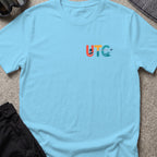 Uncharted Tribe Collective T-Shirt — Shoreline Seal in Sky, front view.