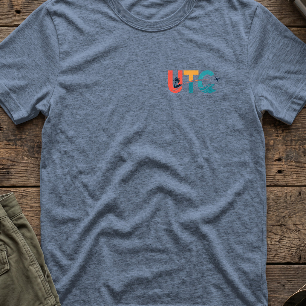Uncharted Tribe Collective T-Shirt — Shoreline Seal in Heather Indigo, front view.