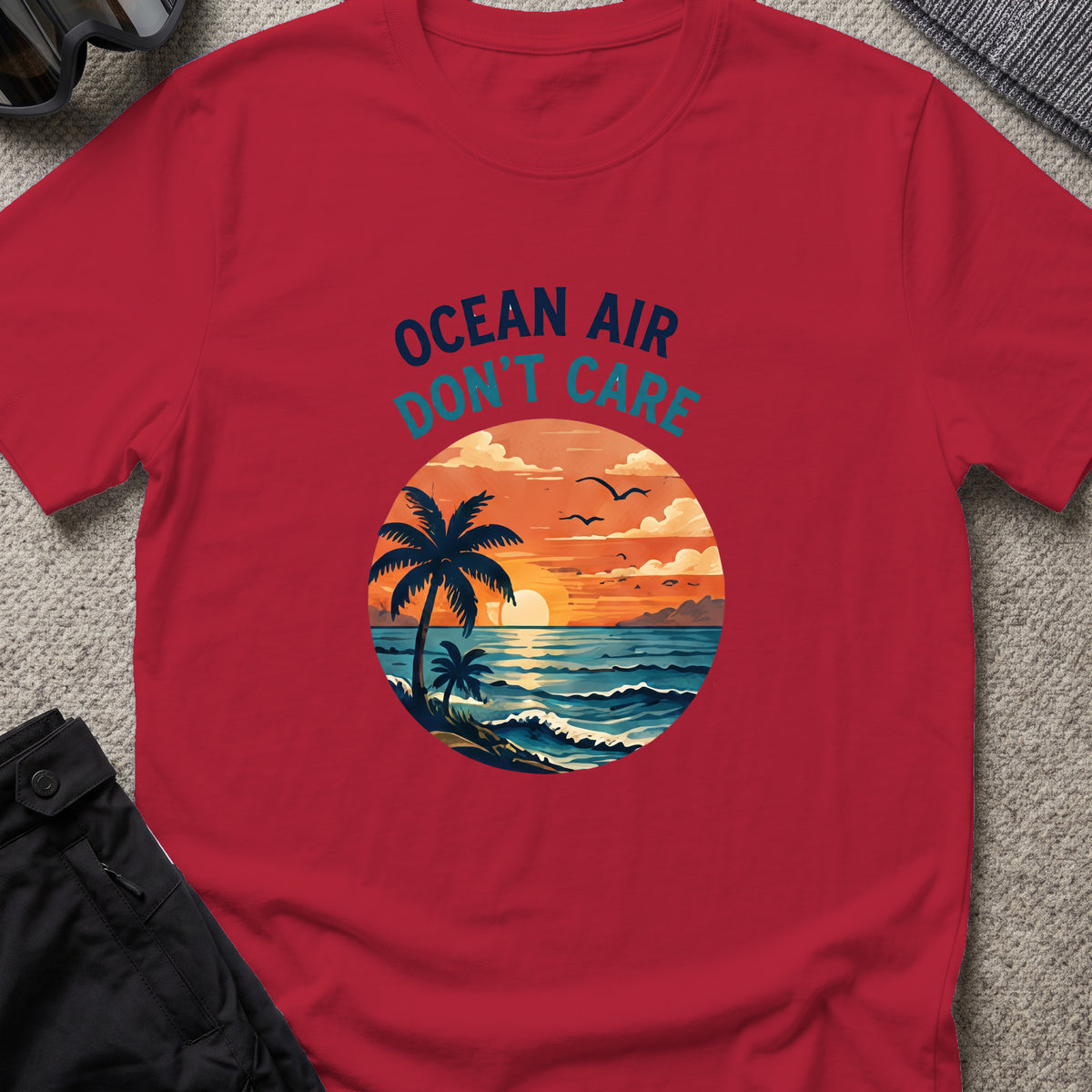 Ocean Air Don't Care T-Shirt in Antique Cherry Red, front view.