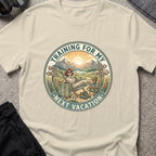 Training for My Next Vacation T-Shirt in Sand, front view.