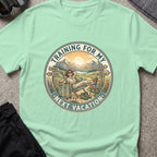Training for My Next Vacation T-Shirt in Mint Green, front view.