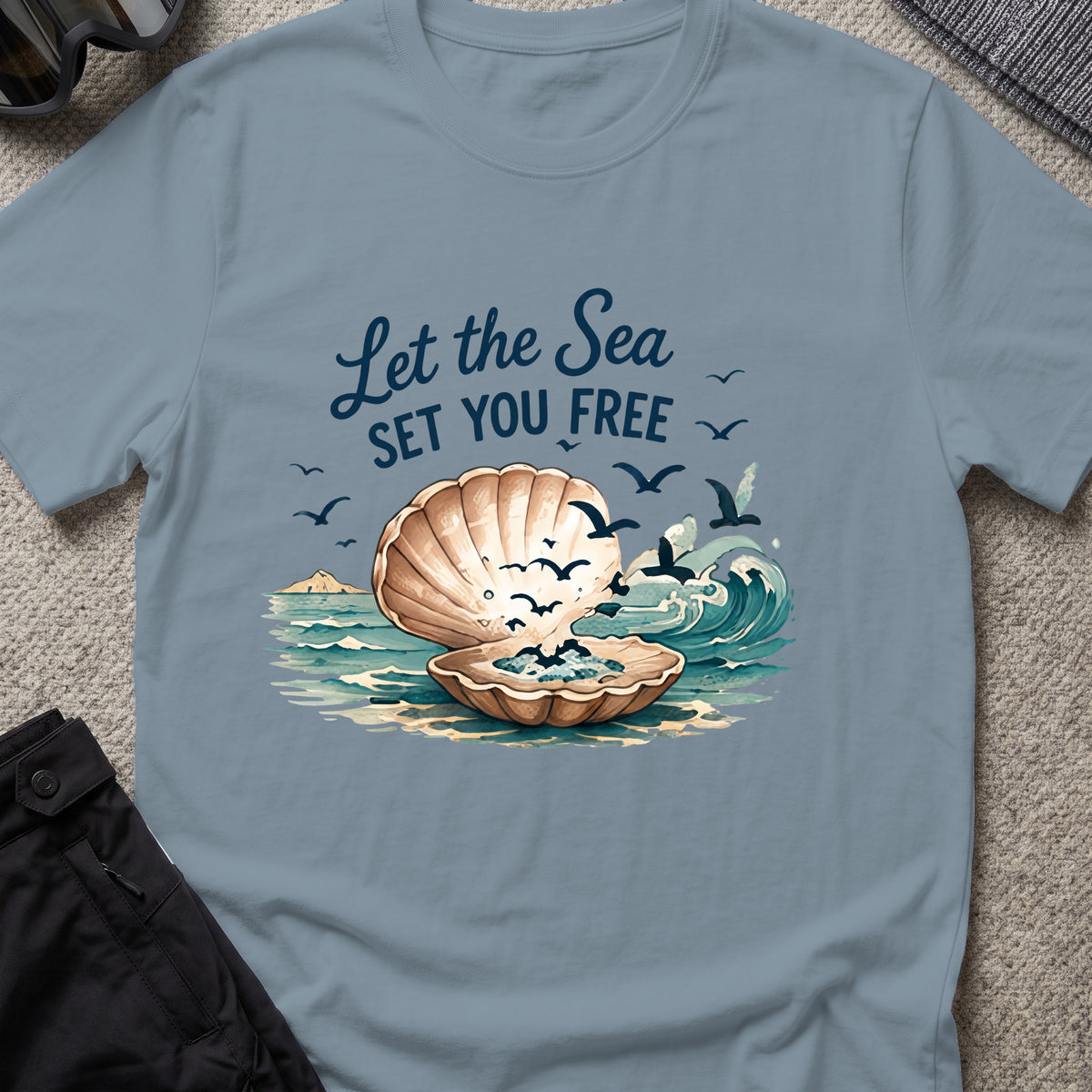 Let the Sea Set You Free T-Shirt in Stone Blue, front view.