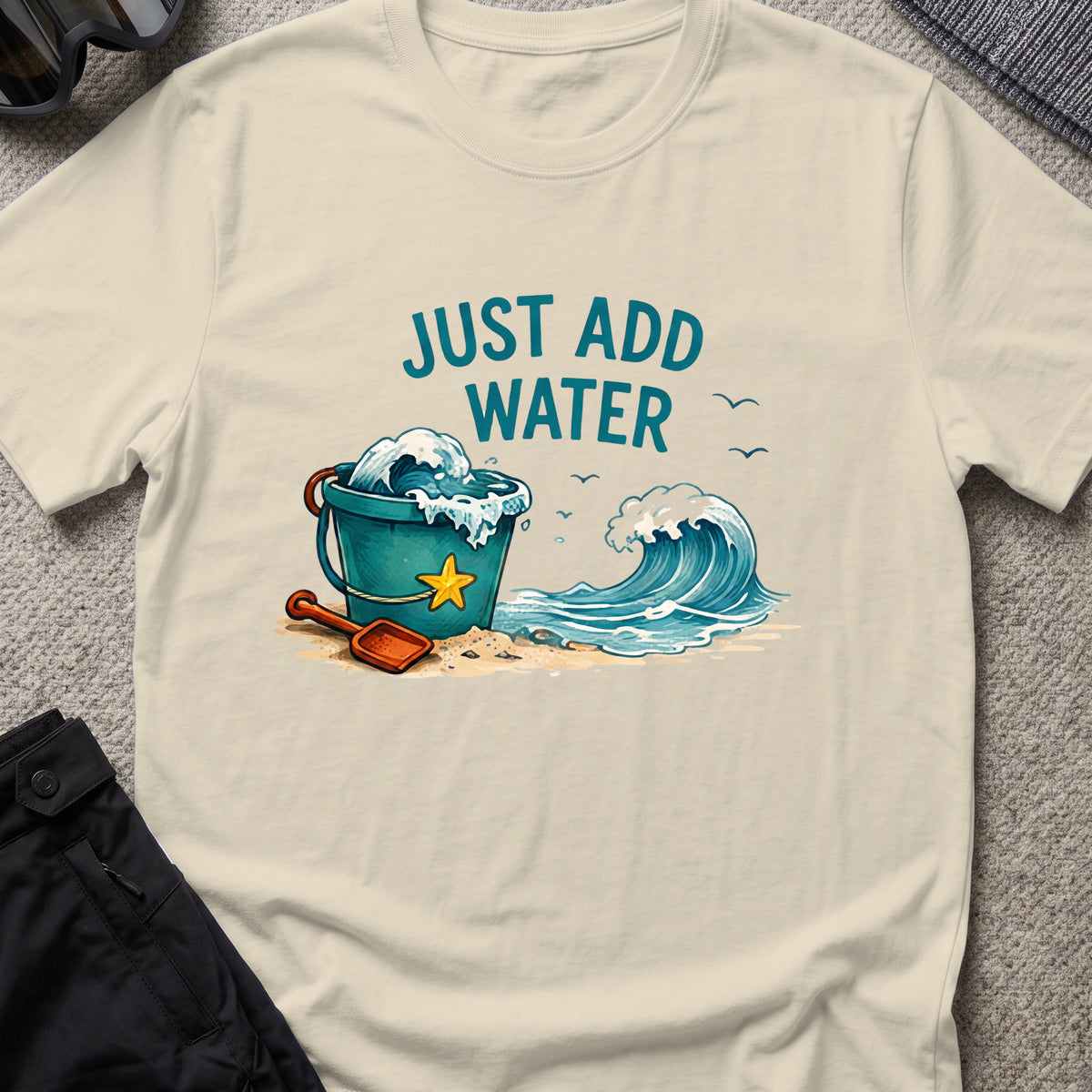 Just Add Water T-Shirt in Sand, front view.
