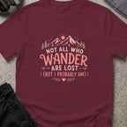 Not All Who Wander Are Lost T-Shirt in Maroon, front view.