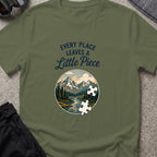 Every Place Leaves a Little Piece T-Shirt in Military Green, front view.