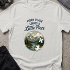 Every Place Leaves a Little Piece T-Shirt in Ice Grey, front view.