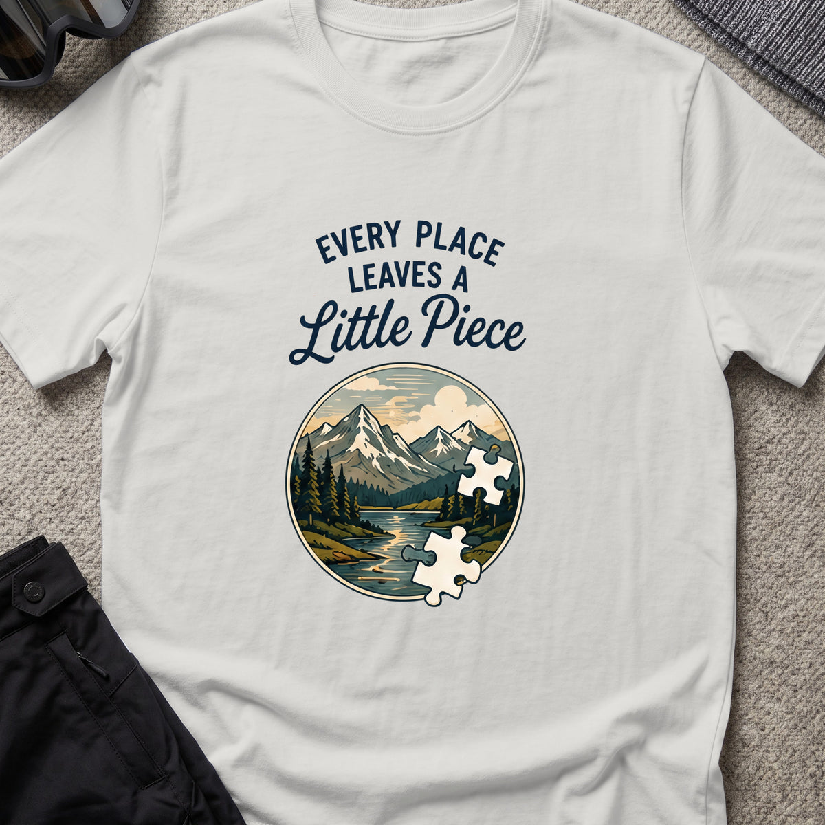 Every Place Leaves a Little Piece T-Shirt in Ice Grey, front view.